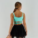 Miętowy top taneczny Corset Glow Mint dla dziewczynki z wstawkami z siatki imitującymi gorset.