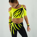 Strój turniejowy do disco dance Lime Slash dla dziewczynki w neonowym limonkowym kolorze i czerni, z dynamicznymi aplikacjami.